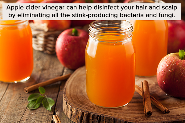 apple cider vinegar can help disinfect your hair and scalp