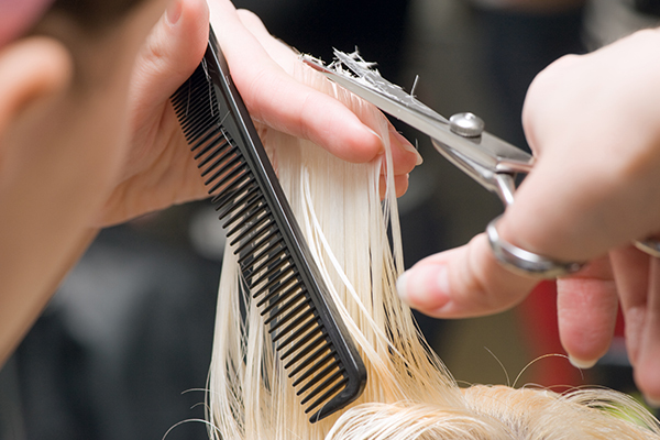 trim your hair regularly for avoiding hair damage