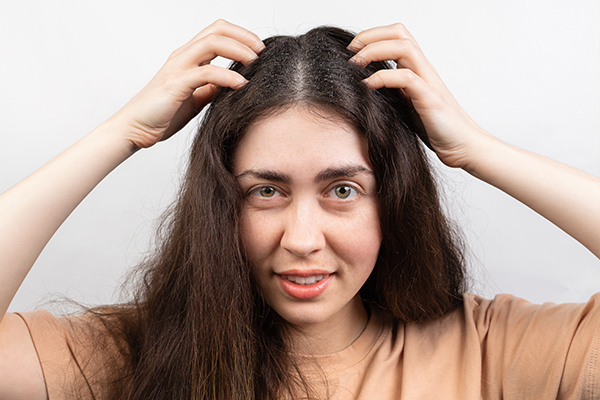 when to consult a doctor regarding scalp buildup?
