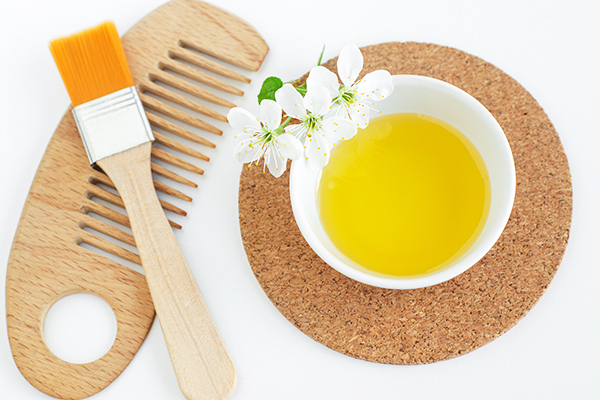 using coconut and olive oil can help improve hair texture
