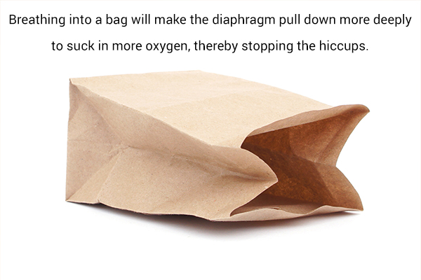 breathing into a bag during hiccups can help stop it