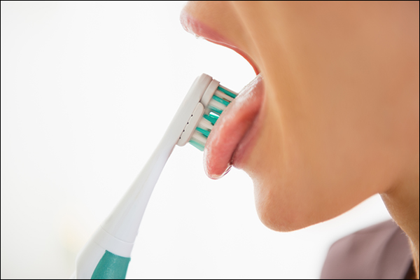 inserting a toothbrush inside your mouth can make you throw up