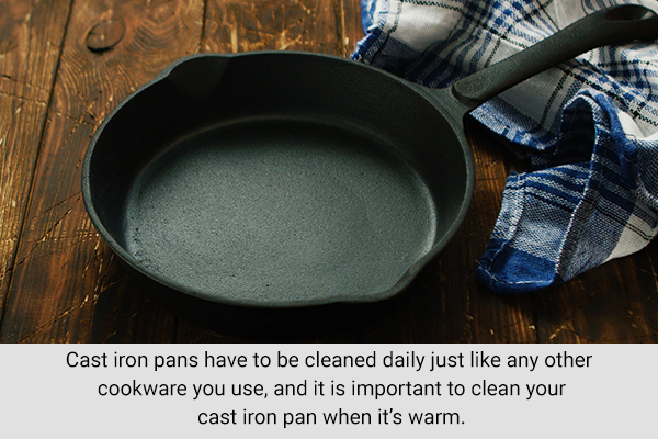 a cast iron pan can be cleaned effectively even when it is warm