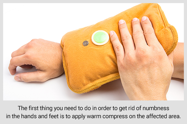 applying a warm compress can help soothe numbness in hands and feet