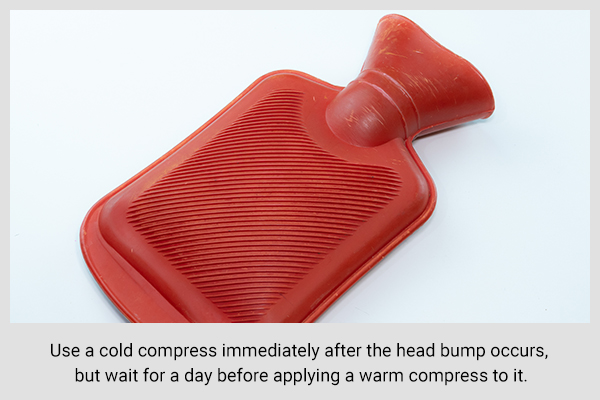 apply a warm compress to reduce head bumps (goose egg)