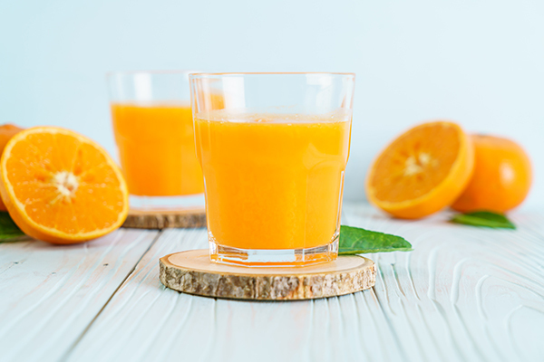 orange juice is rich in vitamin C and helps ensure healthy bones