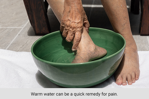 a warm water soak can help relieve sore toe pain