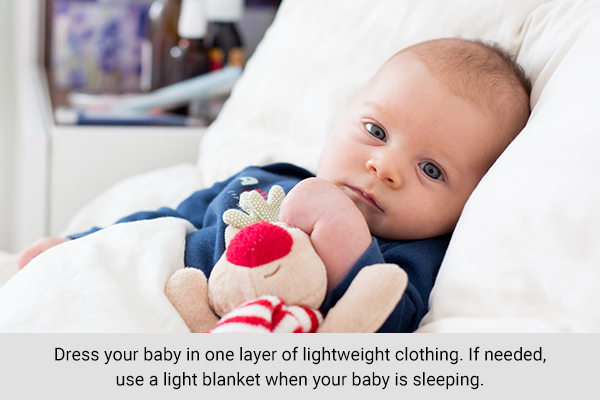dress your baby in proper clothing that can help radiate heat from their bodies