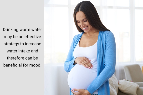 drinking warm water during pregnancy can improve your mood
