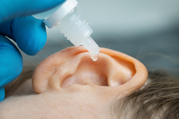 performing vinegar irrigation can help get rid of swimmer's ear