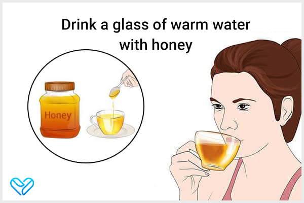 drink a glass of warm water with honey to prevent dry throat
