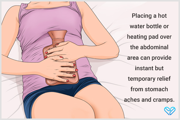 apply a warm compress over the abdominal area for relief from stomach ailments